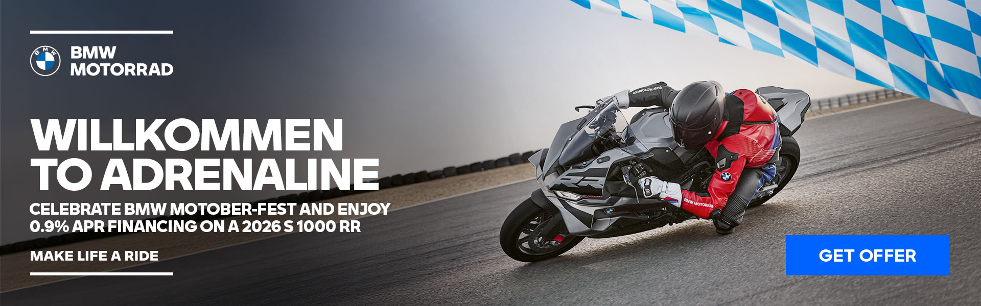 Rider leaning a BMW S 1000 RR into a corner on a racetrack, BMW Motober-Fest offer of 0.9% APR financing on a 2026 S 1000 RR